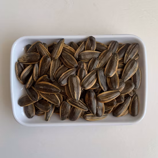 Venta al por mayor de semillas de girasol chinas sin OGM, de alta calidad, a buen precio, crudas y tostadas